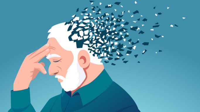 En ældre mand med hvidt skæg rører ved sin pande, mens bagsiden af hans hoved opløses i geometriske fragmenter – en visuel fremstilling af demens.